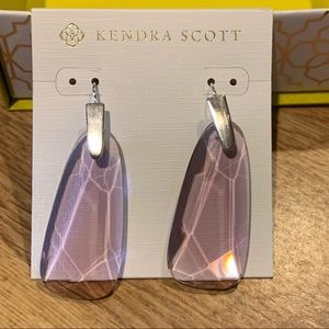 Kendra Scott earrings.